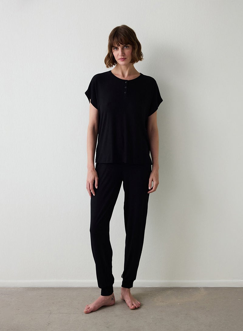 بنتي طقم بيجامة قطن بأكمام قصيرة وياقة دائرية لوقت العطلة - Image 1